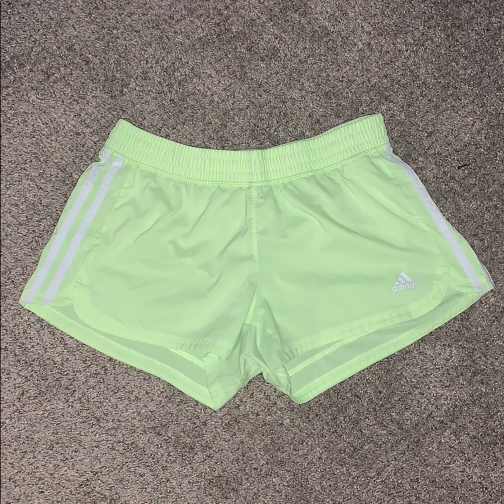 Neon yellow adidas shorts